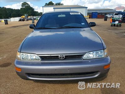 Piąte zdjęcie samochodu w środku: 1995 TOYOTA COROLLA DX VIN:1NXAE09B1SZ280478 - miniatura