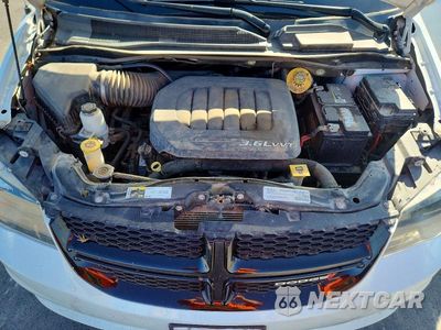 Zdjęcie 12 z 14 samochodu: 2017 DODGE GRAND CARAVAN SE VIN:2C4RDGBG3HR787509 - miniatura