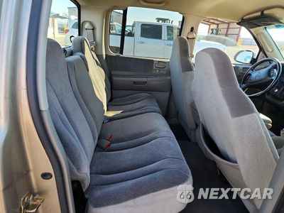 Zdjęcie 10 z 12 samochodu: 2004 DODGE DAKOTA QUAD SLT VIN:1D7HG48N74S507709 - miniatura