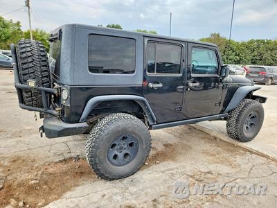 Trzecie zdjęcie samochodu z tyłu: 2009 JEEP WRANGLER UNLIMITED VIN:1J4GA69129L778705 - miniatura