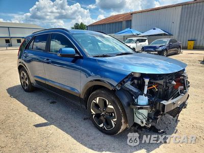Czwarte zdjęcie samochodu z boku: 2023 KIA NIRO WIND VIN:KNDCR3L18P5072442 - miniatura