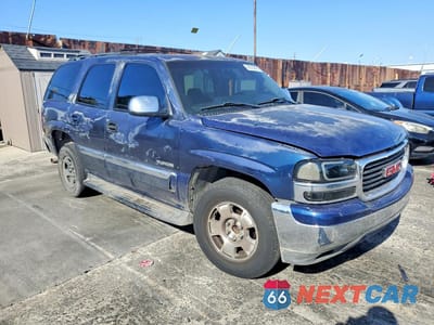 Czwarte zdjęcie samochodu z boku: 2003 GMC YUKON VIN:1GKEC13V93R264607 - miniatura