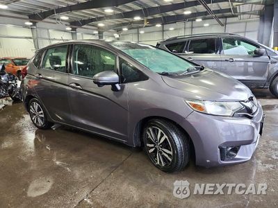 Czwarte zdjęcie samochodu z boku: 2016 HONDA FIT EX VIN:JHMGK5H79GX033781 - miniatura