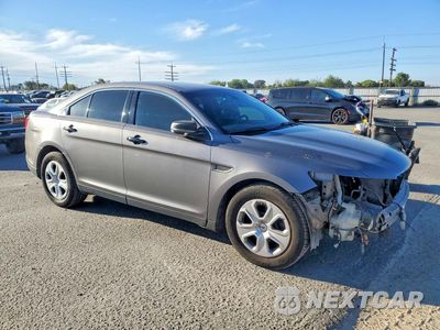 Czwarte zdjęcie samochodu z boku: 2015 FORD TAURUS POLICE INTERCEPTOR VIN:1FAHP2MK7FG112189 - miniatura