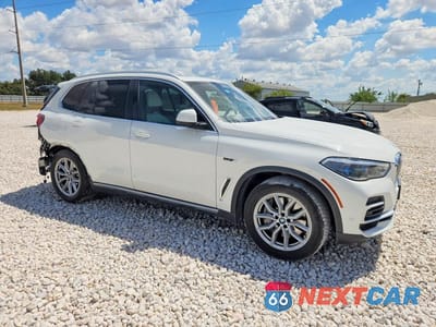 Czwarte zdjęcie samochodu z boku: 2022 BMW X5 XDRIVE45E VIN:5UXTA6C03N9M00273 - miniatura