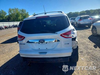 Zdjęcie 6 z 13 samochodu: 2016 FORD ESCAPE TITANIUM VIN:1FMCU9JX4GUC04669 - miniatura