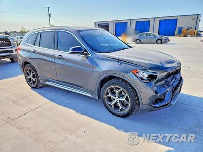 Czwarte zdjęcie samochodu z boku: 2018 BMW X1 SDRIVE28I VIN:WBXHU7C35J3H44043 - miniatura