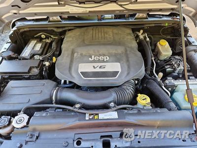 Zdjęcie 12 z 13 samochodu: 2015 JEEP WRANGLER UNLIMITED SPORT VIN:1C4BJWDG1FL771185 - miniatura