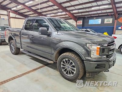 Czwarte zdjęcie samochodu z boku: 2018 FORD F150 SUPER CAB VIN:1FTFX1E51JFC21184 - miniatura