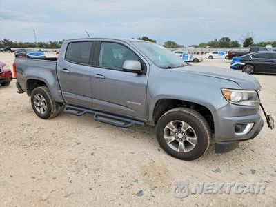 Czwarte zdjęcie samochodu z boku: 2019 CHEVROLET COLORADO Z71 VIN:1GCGSDEN1K1142116 - miniatura