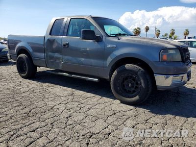 Czwarte zdjęcie samochodu z boku: 2005 FORD F150 VIN:1FTPX12595NA36448 - miniatura