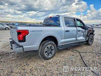Trzecie zdjęcie samochodu z tyłu: 2022 FORD F150 LIGHTNING PRO VIN:1FTVW1EL3NWG05602 - miniatura