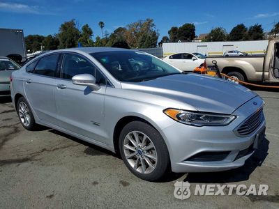 Czwarte zdjęcie samochodu z boku: 2018 FORD FUSION SE PHEV VIN:3FA6P0PU1JR111050 - miniatura