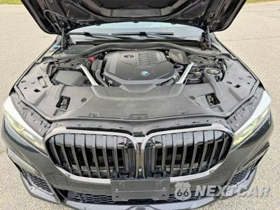 Zdjęcie 7 z 14 samochodu: 2022 BMW 740 XI VIN:WBA7T4C03NCK23662 - miniatura
