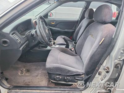 Zdjęcie 7 z 12 samochodu: 2002 HYUNDAI SONATA BASE VIN:KMHWF25S32A681777 - miniatura