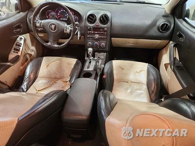 Zdjęcie 8 z 12 samochodu: 2009 PONTIAC G6 VIN:1G2ZJ57B894249987 - miniatura