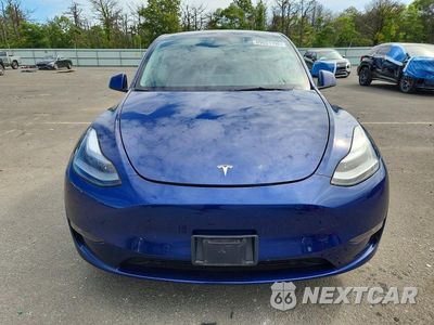 Piąte zdjęcie samochodu w środku: 2023 TESLA MODEL Y VIN:7SAYGAEE0PF977808 - miniatura