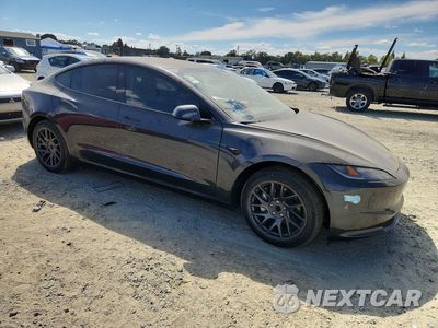Czwarte zdjęcie samochodu z boku: 2025 TESLA MODEL 3 VIN:5YJ3E1EA3SF976350 - miniatura