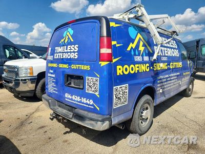 Trzecie zdjęcie samochodu z tyłu: 2015 CHEVROLET EXPRESS G2500 VIN:1GCWGFCF5F1129850 - miniatura