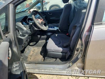 Zdjęcie 7 z 13 samochodu: 2009 HONDA FIT VIN:JHMGE882X9S043460 - miniatura