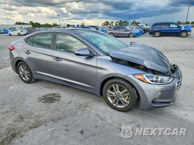 Czwarte zdjęcie samochodu z boku: 2018 HYUNDAI ELANTRA VALUE EDITION VIN:5NPD84LF9JH258930 - miniatura