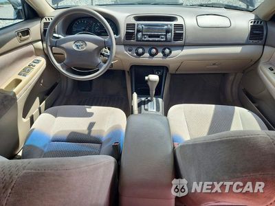 Zdjęcie 8 z 12 samochodu: 2003 TOYOTA CAMRY LE VIN:4T1BE30K73U158809 - miniatura