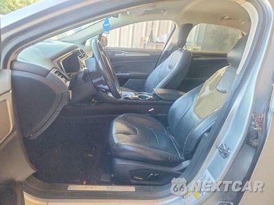 Zdjęcie 7 z 12 samochodu: 2013 FORD FUSION TITANIUM VIN:3FA6P0D9XDR237752 - miniatura