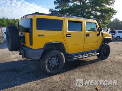Trzecie zdjęcie samochodu z tyłu: 2004 HUMMER H2 VIN:5GRGN23U44H103065 - miniatura