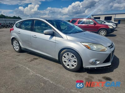 Czwarte zdjęcie samochodu z boku: 2012 FORD FOCUS SE VIN:1FAHP3K22CL149324 - miniatura