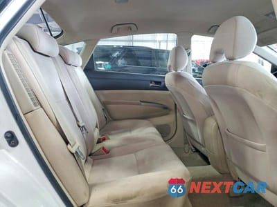 Zdjęcie 11 z 14 samochodu: 2004 TOYOTA PRIUS BASE VIN:JTDKB20U140083722 - miniatura
