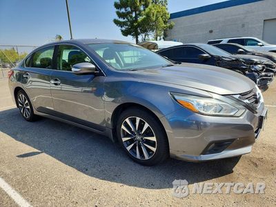 Czwarte zdjęcie samochodu z boku: 2016 NISSAN ALTIMA 2.5 SL VIN:1N4AL3AP0GC202182 - miniatura
