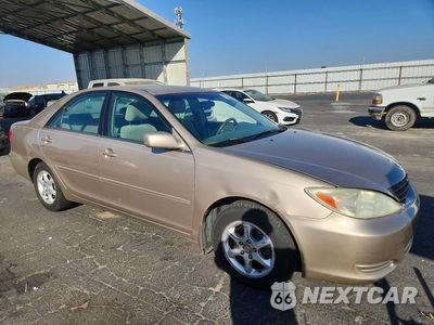 Czwarte zdjęcie samochodu z boku: 2002 TOYOTA CAMRY LE VIN:4T1BE30K62U025862 - miniatura