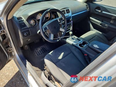 Zdjęcie 8 z 12 samochodu: 2009 DODGE CHARGER SXT VIN:2B3KA33V99H544845 - miniatura