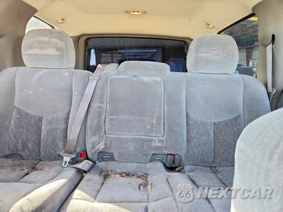 Zdjęcie 10 z 13 samochodu: 2004 CHEVROLET TAHOE C1500 VIN:1GNEC13V44J161856 - miniatura