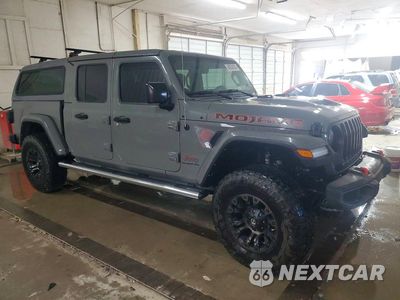 Czwarte zdjęcie samochodu z boku: 2022 JEEP GLADIATOR MOJAVE VIN:1C6JJTEG1NL153671 - miniatura