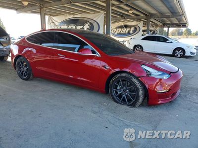 Czwarte zdjęcie samochodu z boku: 2018 TESLA MODEL 3 VIN:5YJ3E1EAXJF041163 - miniatura