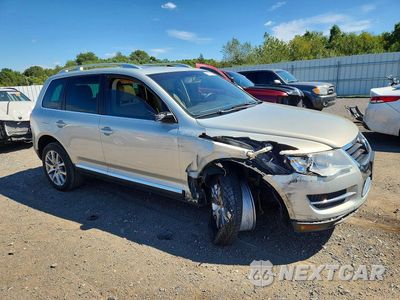 Czwarte zdjęcie samochodu z boku: 2010 VOLKSWAGEN TOUAREG V6 VIN:WVGBF7A96AD003939 - miniatura