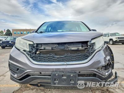 Piąte zdjęcie samochodu w środku: 2015 HONDA CR-V LX VIN:2HKRM4H38FH609799 - miniatura