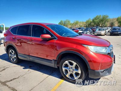 Czwarte zdjęcie samochodu z boku: 2018 HONDA CR-V EX VIN:2HKRW2H57JH631396 - miniatura