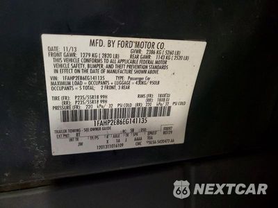 Zdjęcie 12 z 12 samochodu: 2014 FORD TAURUS SEL VIN:1FAHP2E86EG141135 - miniatura