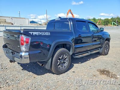 Trzecie zdjęcie samochodu z tyłu: 2022 TOYOTA TACOMA TRD OFF-ROAD VIN:3TMCZ5AN3NM498841 - miniatura