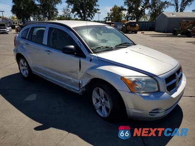 Czwarte zdjęcie samochodu z boku: 2010 DODGE CALIBER SXT VIN:1B3CB4HA3AD538876 - miniatura