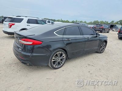 Trzecie zdjęcie samochodu z tyłu: 2019 FORD FUSION TITANIUM VIN:3FA6P0D92KR121099 - miniatura