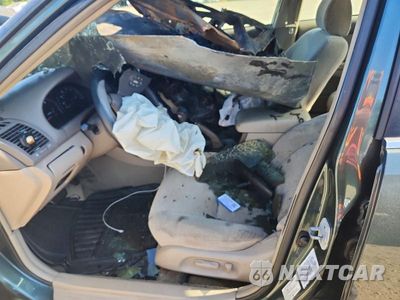 Zdjęcie 7 z 12 samochodu: 2003 TOYOTA CAMRY LE V6 VIN:4T1BF32K73U545645 - miniatura