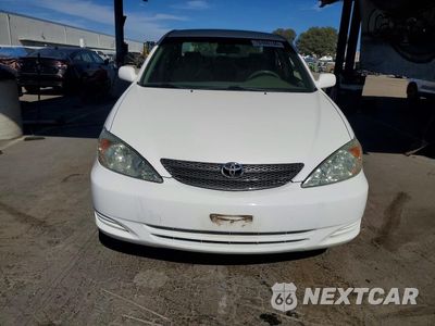 Piąte zdjęcie samochodu w środku: 2003 TOYOTA CAMRY LE V6 VIN:JTDBF32K230131975 - miniatura
