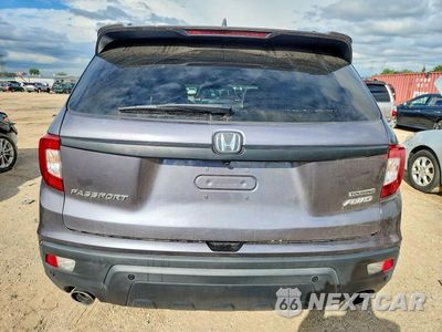 Zdjęcie 6 z 12 samochodu: 2021 HONDA PASSPORT TOURING VIN:5FNYF8H96MB041484 - miniatura