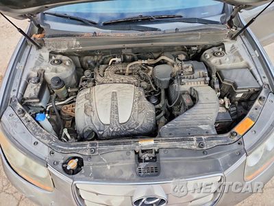 Zdjęcie 11 z 12 samochodu: 2011 HYUNDAI SANTA FE SE VIN:5XYZH4AG6BG056833 - miniatura