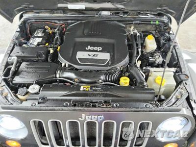 Zdjęcie 12 z 13 samochodu: 2017 JEEP WRANGLER SAHARA VIN:1C4AJWBG6HL505114 - miniatura