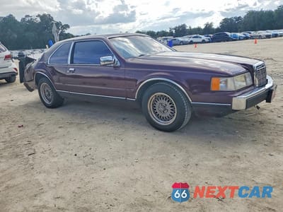 Czwarte zdjęcie samochodu z boku: 1990 LINCOLN MARK VII LSC VIN:1LNCM93E6LY662583 - miniatura