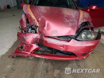 Zdjęcie 11 z 12 samochodu: 2006 HYUNDAI TIBURON GS VIN:KMHHM65D06U207085 - miniatura